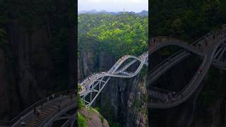 The Ruyi Bridge in Shenxianju is 100 meters long and hangs on a 600meterhigh cliff travel china [upl. by Chlori]