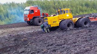 Heavy tractor got stuck in mud Powerful tractors work in extreme off road conditions [upl. by Anerec]