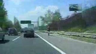 Motorbike rider pulls crazy wheelie on hard shoulder at 80mph [upl. by Garfield]