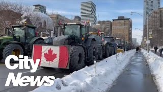 Truckers begin to gather in Toronto for antimandate convoy [upl. by Eiramac]