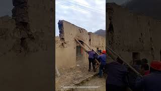 Simple Demolition Way Of Using Logs To Push Down The Adobe Wall In Rural [upl. by Suilmann]