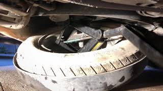 remove the spare on a dodge grand caravan [upl. by Rorry]