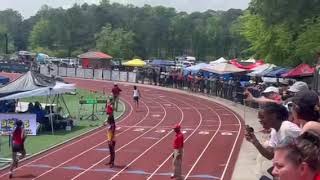 Sydney receives the baton to run anchor leg in the 4x800 relay at the GA State MS track championship [upl. by Noyerb]