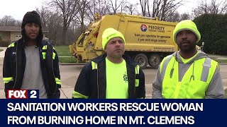 WATCH Sanitation workers rescue woman from burning home [upl. by Doria428]