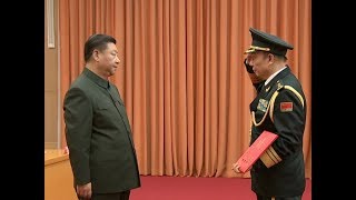 China Promotes Military Anti graft Chief to General [upl. by Ecnerret205]