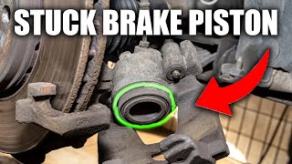 How to remove a stuck brake caliper piston EASY FIX [upl. by Enohpets]