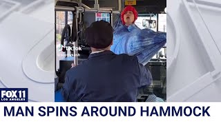 Man refuses to take down hammock on bus [upl. by Assiluy]