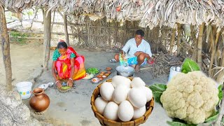 EGG CAULIFLOWER RECIPE and KOLMI SHAK VAJI cooking by our tribe old couple for lunch [upl. by Rockefeller]