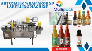 Wrap around labeler for chilli sauce  labelling machine  UAE  uae  Dubai  dubai  labelling [upl. by Nalliuq196]