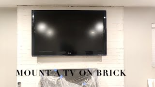 How to Mount a TV onto a Brick Fireplace [upl. by Nacim]