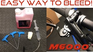 Shimano M6000 Hydraulic Brake Bleed [upl. by Margo630]