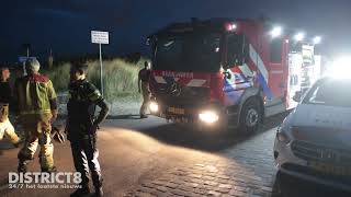 Brandweer bevrijdt meisje uit winkelwagen Strandslag 10 Den Haag [upl. by Hagerman23]