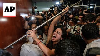 Protesters storm Mexicos Senate over a contentious plan to overhaul judiciary [upl. by Idnib]