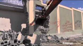 Libya Rebels demolish Gaddafis home [upl. by Anaert]