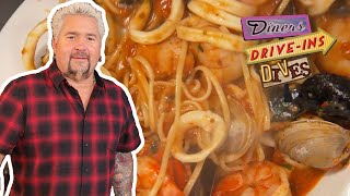 Guy Fieri Eats the quotSeafood Buffet for 90quot in Baltimore  Diners DriveIns and Dives  Food Network [upl. by Wiener307]