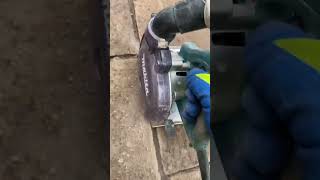 Raking out paving joints using a Makita 4100KB masonry saw with an 8mm diamond disc [upl. by Checani]