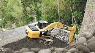 CAT Excavator Collecting Gravel [upl. by Metzgar]