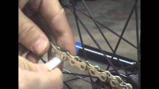 How to remove a bicycle chain with a master link [upl. by Atokad]