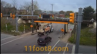 Crane truck almost defeats the 11foot88 bridge [upl. by Trahurn]