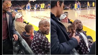 Most Awkward Handshake Ever Manny Pacquiao Runs Up On Floyd Mayweather At Lakers Game [upl. by Juley]