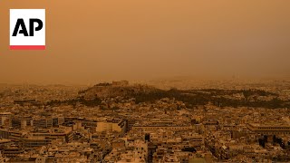 Athens Greece skies turn orange with dust clouds from North Africa [upl. by Lairea]