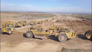 Digging new landfill cell with fleet of Caterpillar scrapers Part 1 [upl. by Ianahs]