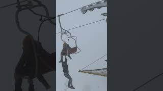 A man found himself hanging precariously from a ski lift clinging on to his partner for dear life 😰 [upl. by Irac]