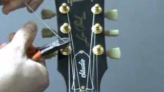 How to re string a guitar [upl. by Ttegdirb346]