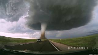 Storm chasing dashcam Tornado crossing the highway Laramie Wyoming [upl. by Sokim]