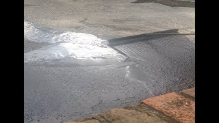 How To Seal Coat A Driveway [upl. by Towers]