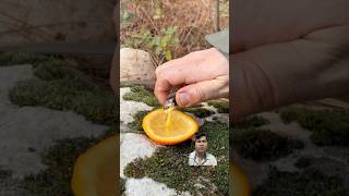 He made an oil lamp from an orange bushcraft camping nature [upl. by Yahsram35]