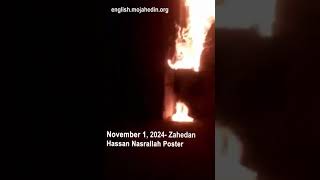 Protesters torch poster of Hassan Nasrallah in Zahedan  Iran protests [upl. by Annovoj231]