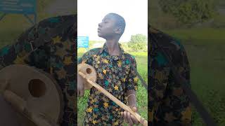 Adugbire is very talented just listen to the beautiful melody of the small kologo instrument [upl. by Min355]