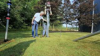 Installing a Post Master Fence Post with a Titan Post Driver [upl. by Ellemaj]