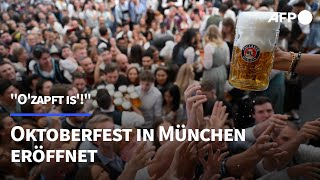 quotOzapft isquot Oktoberfest in München eröffnet  AFP [upl. by Kcinom703]