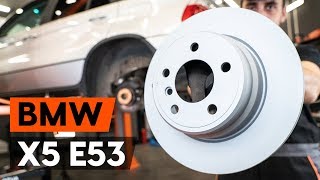 How to change rear brake discs  rear brake rotors on BMW X5 E53 TUTORIAL AUTODOC [upl. by Arihsay]