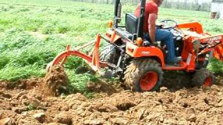 Kubota BX2200 Plowing the garden [upl. by Llerad761]