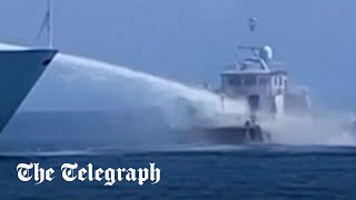 Chinese ships fire water cannons on Philippine resupply vessels in South China Sea [upl. by Evin]