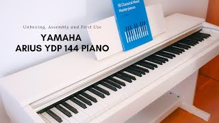 Yamaha ARIUS YDP 144 Piano Unboxing Assembly and First Use [upl. by Fletch]