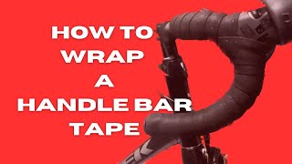 How to wrap a handlebar tape on a road bike [upl. by Ruder]