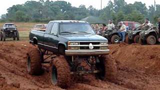 MUD TRUCKS Chevy Silverado on 54quot BOGGERS MUD BOGGIN [upl. by Ametaf]