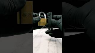 Coolest way to open a beer but its a padlock and we’re shilling new tools you dont need but want [upl. by Anitsrhc]