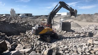 volvo ec530 excavator in quarry feeding jonsson 1208 jaw crusher komatsu wa500 [upl. by Enined]