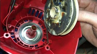 Troy Bilt String Trimmer STARTER RECOIL SPRING REPAIR [upl. by Annayhs]