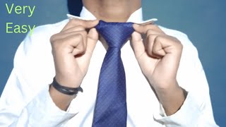 How to tie a tie Easy Way Slowly and Mirrored  Windsor Knot [upl. by Beisel]