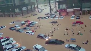 Rivers overflowing China flooded Underground garages highways and building submerged [upl. by Grady]