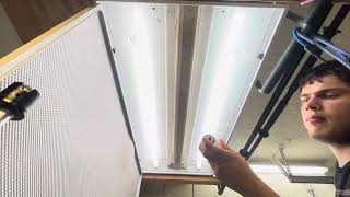 How to change a fluorescent bulb in a Fluorescent drop ceiling troffer fixture [upl. by Anilemrac857]