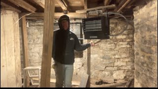 Installing an electric heater in the stone house [upl. by Nyladgam]