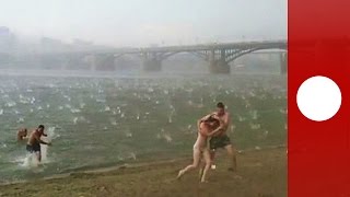 Freak hailstorm hits Siberia beach sends people running for cover [upl. by Corilla]