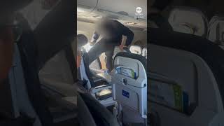 Disruptive passenger kicks chair on United flight from Austin to Los Angeles [upl. by Lauter]